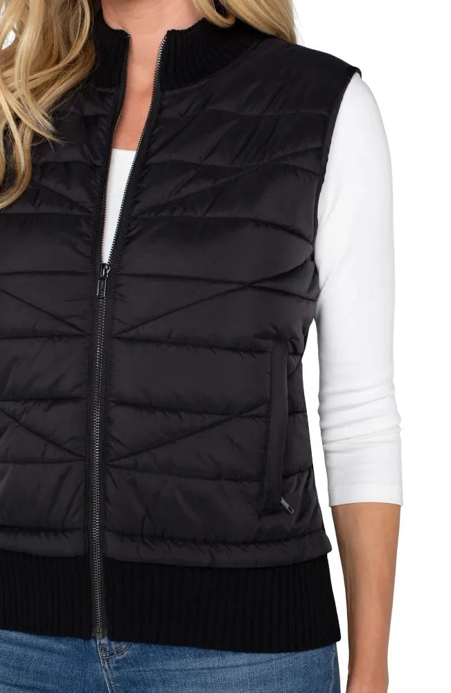 Black Sleeveless Quilted Vest by LA