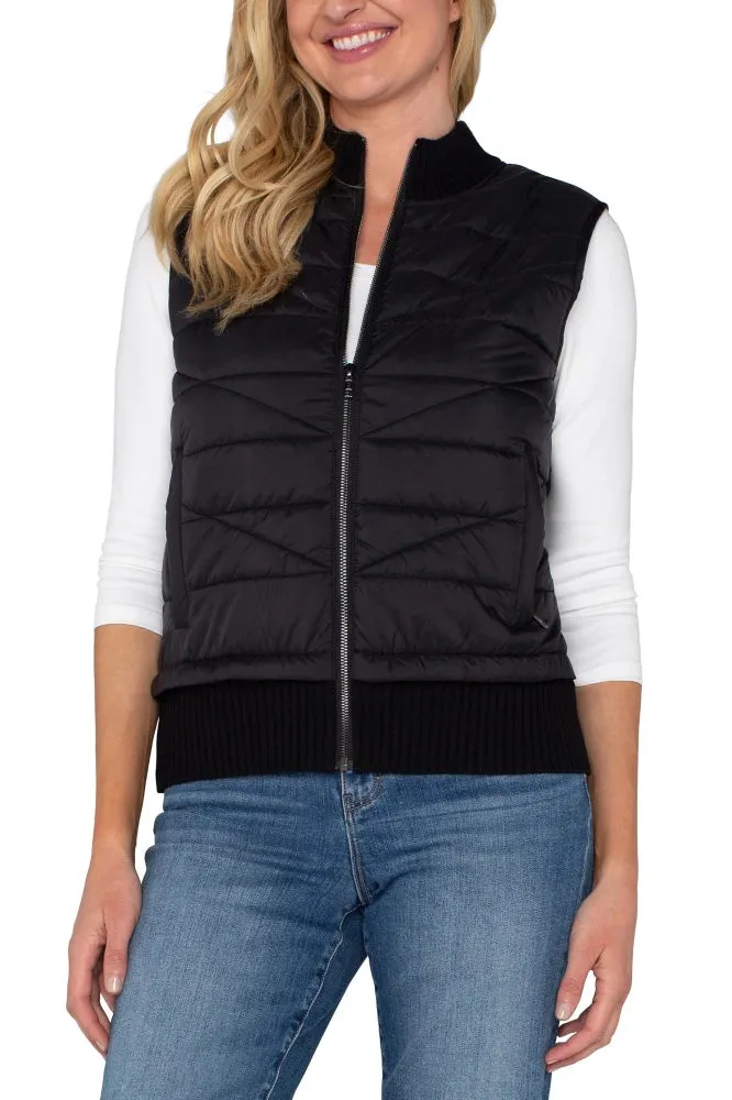 Black Sleeveless Quilted Vest by LA