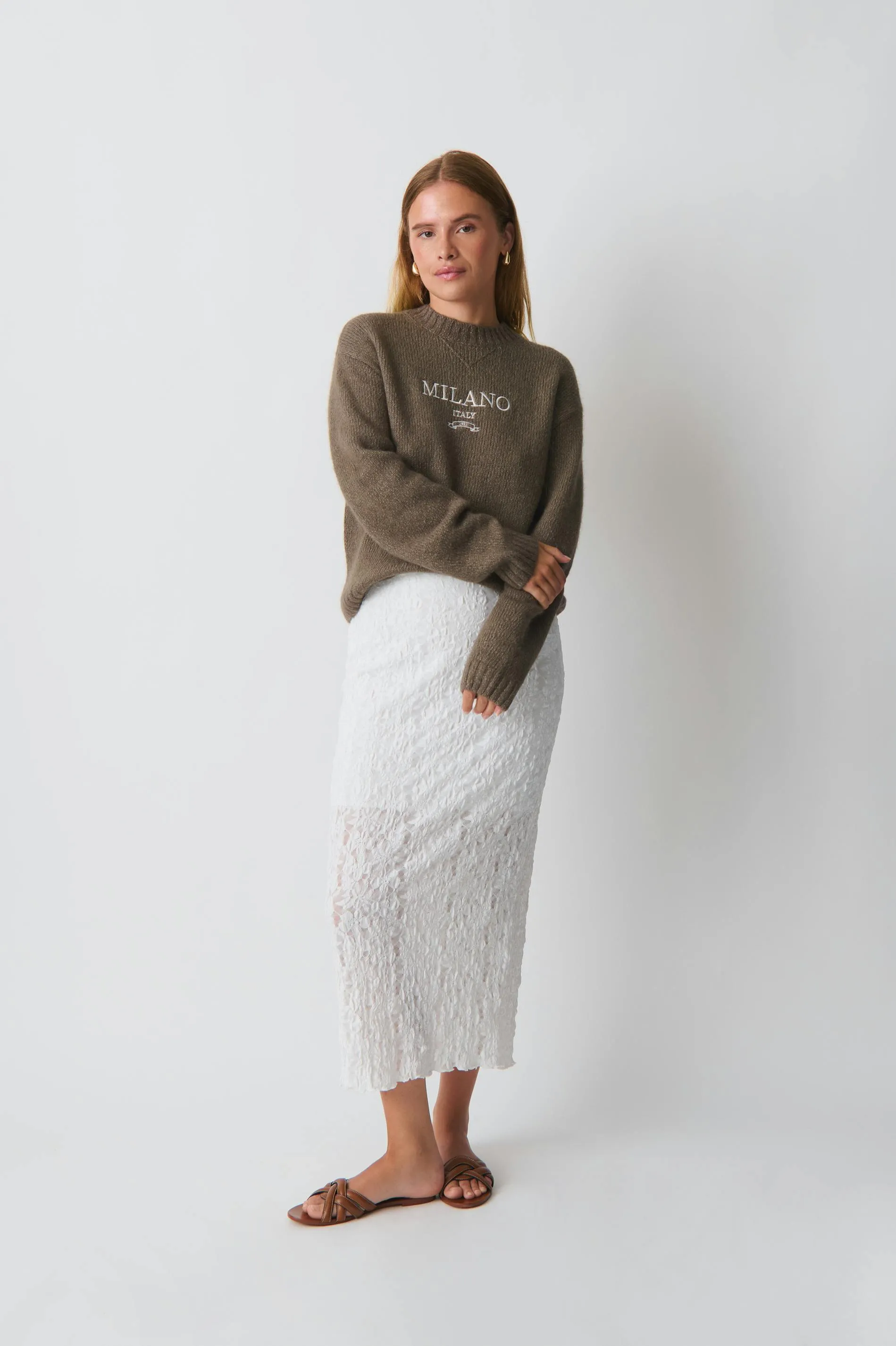 Knit sweater with embroidered details