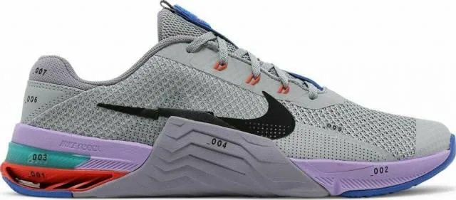 Nike men's training shoes in light smoke grey, purple, and black