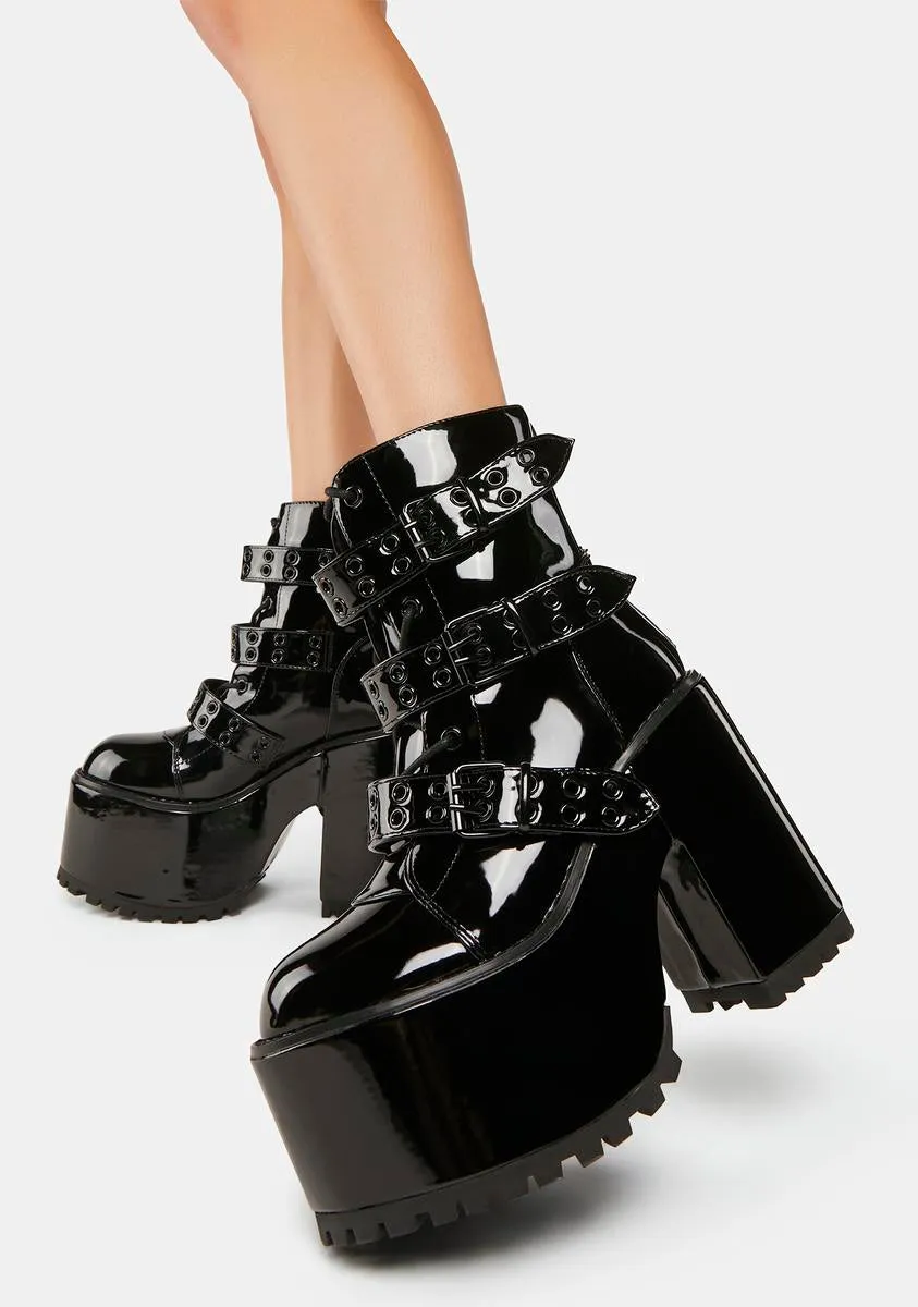 Strapped Platform Boots with Blackout Smash Design