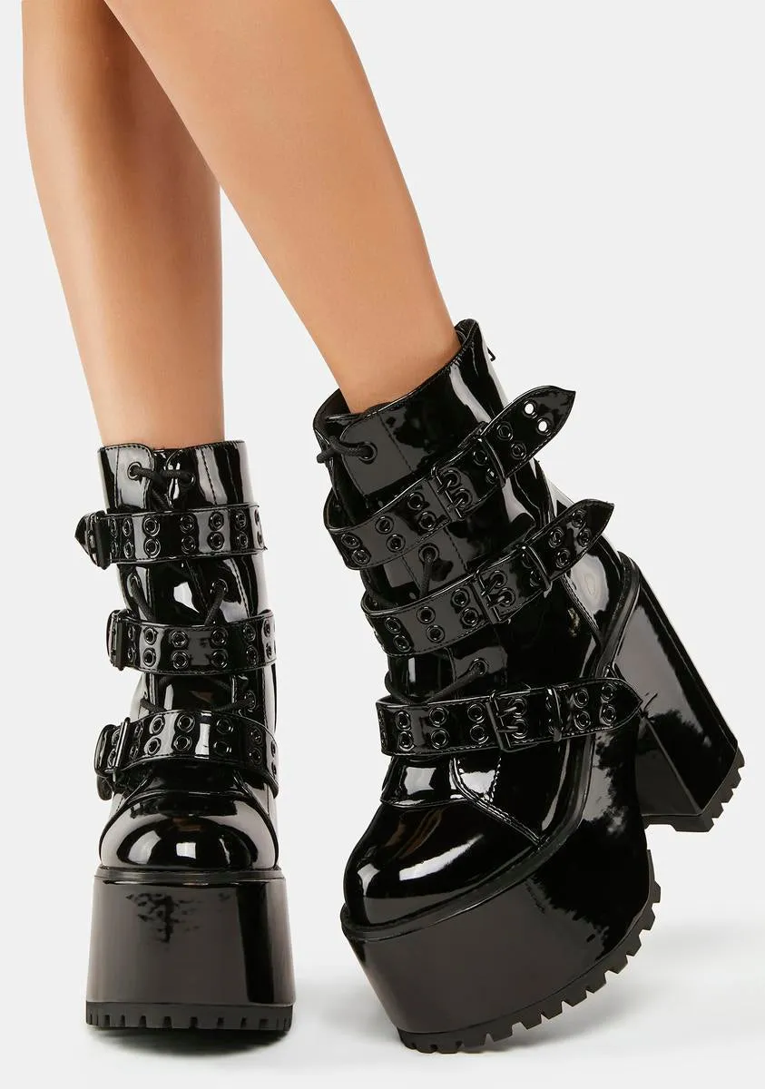 Strapped Platform Boots with Blackout Smash Design