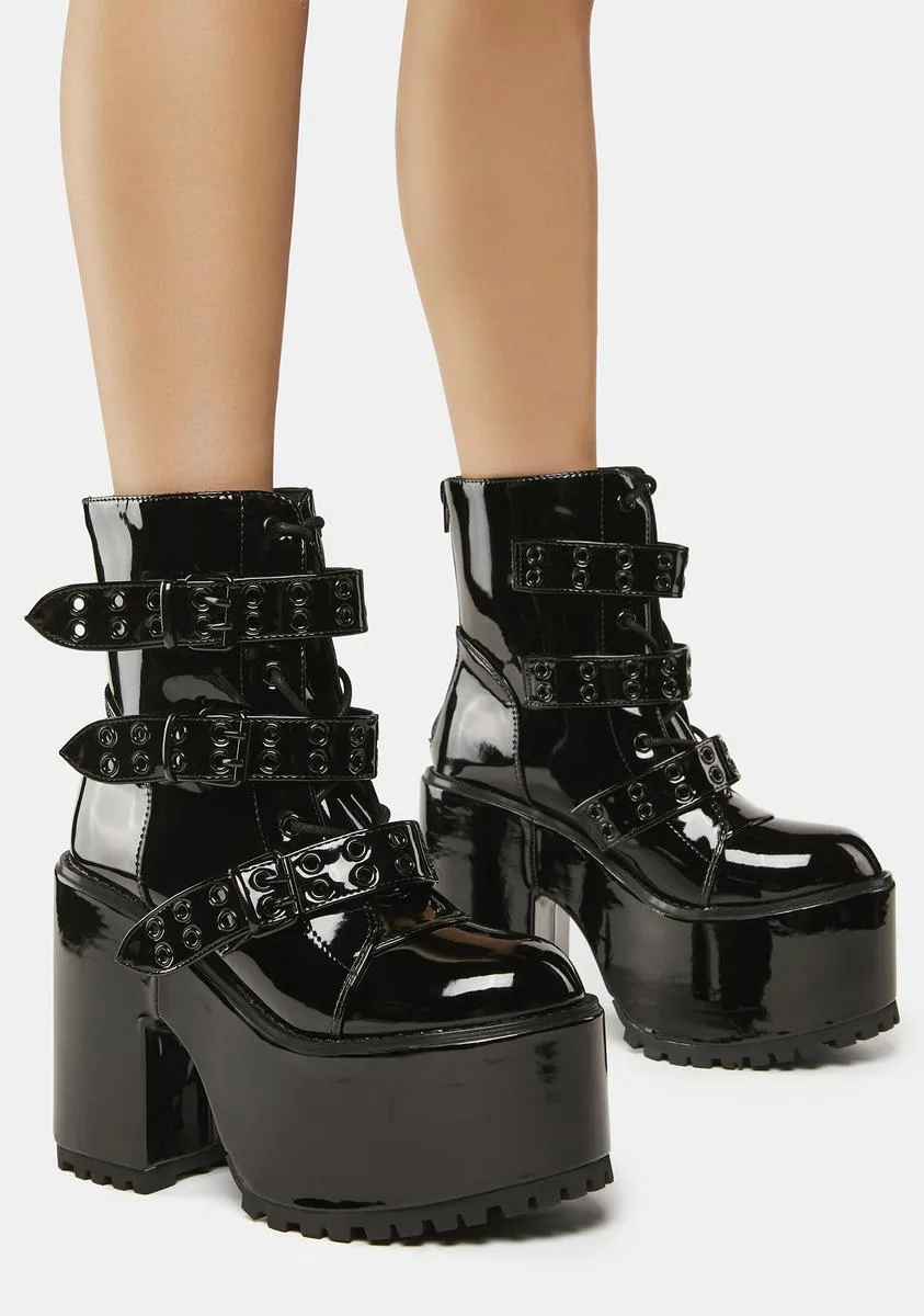 Strapped Platform Boots with Blackout Smash Design