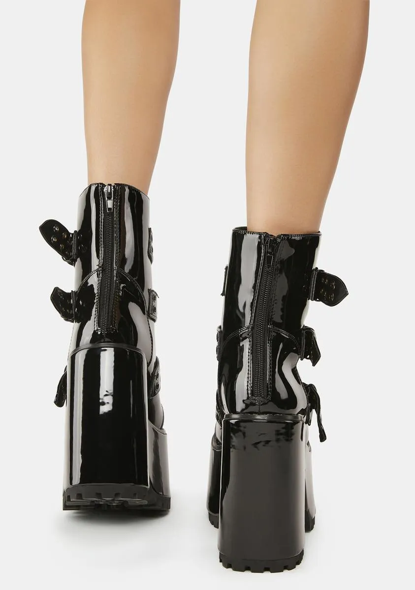 Strapped Platform Boots with Blackout Smash Design